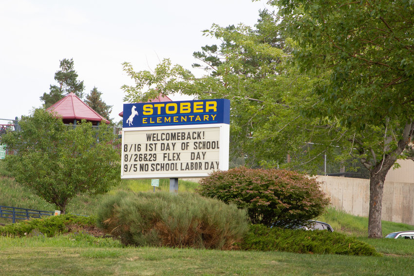 A sign in front of Stober Elementary welcomes students back for the fall 2022 semester.